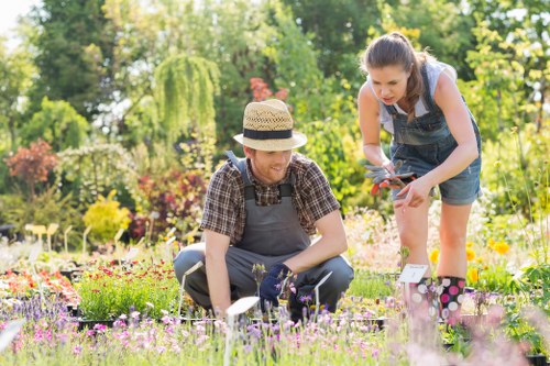 Gardeners working on a Tooting Bec front garden