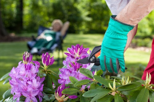 Garden worker preparing a safe work area before task execution